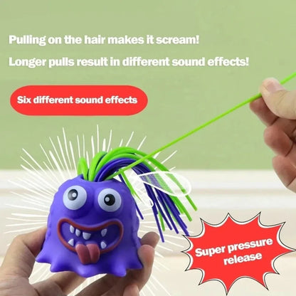 Hair Pulling Screaming Monster Toy